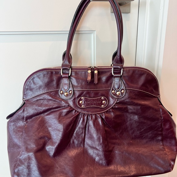 Longchamp Handbags - Used women’s leather Longchamp bag with handles